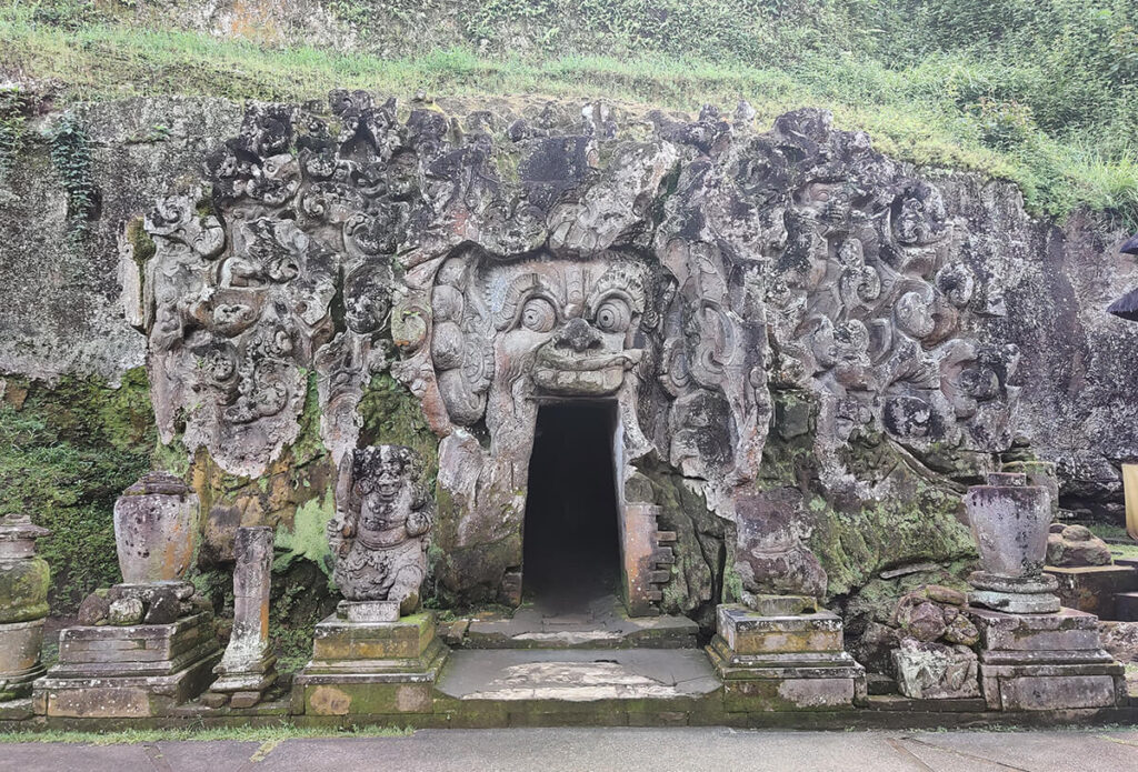 Goa Gajah Temple carved into the side of a cliff