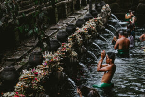 Man bathing in the spiritual waters of Tirta Empul